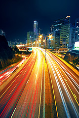 Image showing Night traffic on a busy city highway