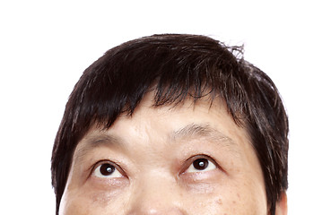 Image showing Close-up of woman looking up. Isolated on white background. 