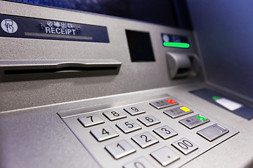 Image showing Close up of an ATM machine. Keyboard and insert card 