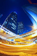 Image showing Colorful city night with lights of cars motion blurred in hong k