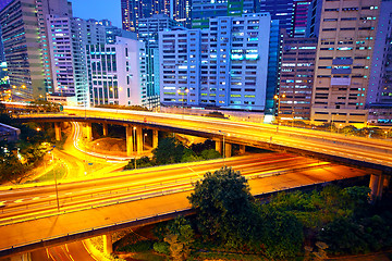 Image showing urban area dusk, busy traffic 