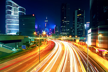 Image showing Colorful city night with lights of cars motion blurred in hong k
