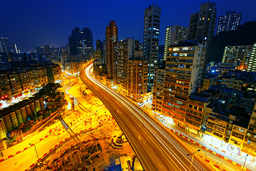 Image showing Colorful city night with lights of cars motion blurred in hong k