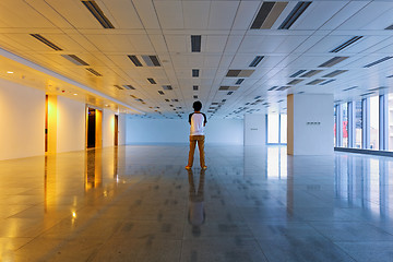 Image showing Man stand in empty floor