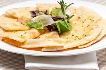 Image showing garlic pita bread pizza with salad on top