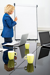 Image showing Female Environmentalist at the Flipchart