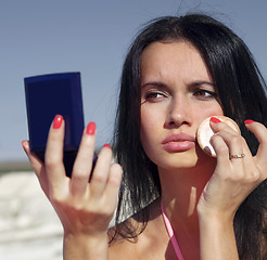 Image showing beautiful face with mirror