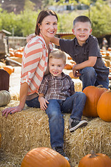 Image showing Portrait of Attractive Mother and Her Sons at Pumpkin Patch
