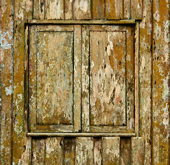 Image showing Shuttered window of old wooden house