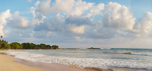 Image showing Picturesque clouds over tropical beach