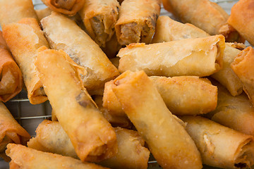 Image showing Spring rolls on the market close up