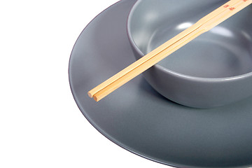 Image showing Bowl with chopsticks