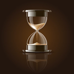 Image showing Sand falling in the hourglass.