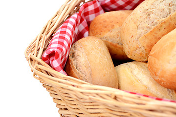 Image showing Closeup of fresh bread rolls in a wicker basket