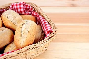 Image showing Closeup of fresh petit pain in a basket