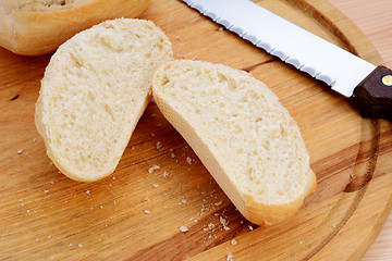 Image showing Closeup of a freshly cut bread roll