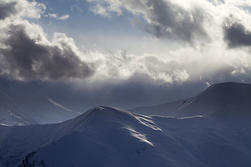 Image showing Evening mountain and sunlight clouds