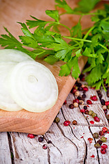 Image showing fresh sliced onion, peppercorns and parsley