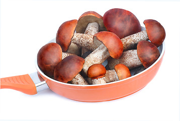 Image showing The pan filled with mushrooms intended for cooking.Photographed 