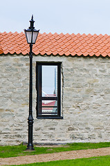 Image showing Window aperture in a wall from calcareous stones, a close up