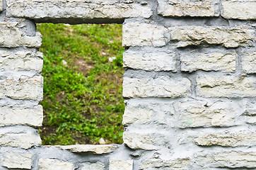 Image showing Window aperture in a wall from calcareous stones, a close up