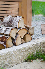 Image showing A pile of Birch wood in the garden, close-up 