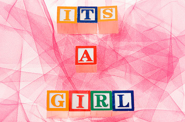 Image showing Letter blocks spelling 'its a girl'