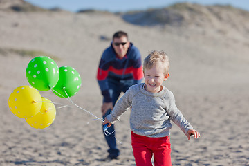 Image showing family at the beach