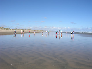 Image showing Standing on the beach