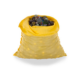 Image showing Assorted black glass marbles arranged in a yellow pouch