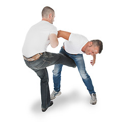 Image showing Man defending an attack from another man, selfdefense