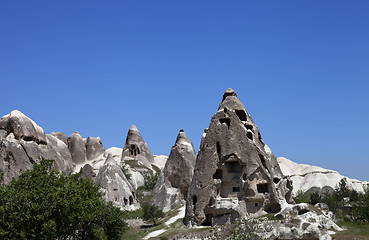 Image showing Cave houses and church