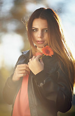 Image showing Girl with a flower