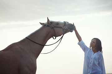 Image showing Woman and horse