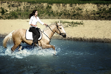 Image showing Riding in water