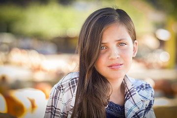 Image showing Preteen Girl Portrait at the Pumpkin Patch