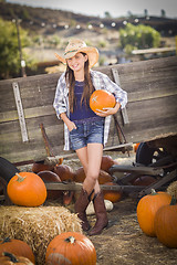 Image showing Preteen Girl Portrait at the Pumpkin Patch