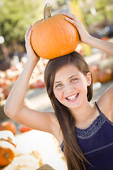 Image showing Preteen Girl Portrait at the Pumpkin Patch