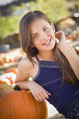 Image showing Preteen Girl Portrait at the Pumpkin Patch