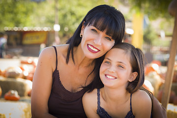 Image showing Attractive Mother and Daughter Portrait at the Pumpkin Patch
