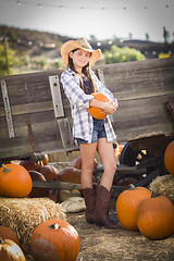 Image showing Preteen Girl Portrait at the Pumpkin Patch