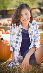 Image showing Preteen Girl Portrait at the Pumpkin Patch