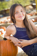 Image showing Preteen Girl Portrait at the Pumpkin Patch