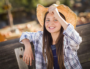 Image showing Preteen Girl Portrait at the Pumpkin Patch