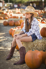 Image showing Preteen Girl Portrait at the Pumpkin Patch