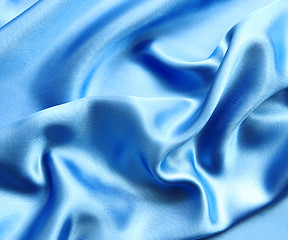 Image showing Smooth elegant blue silk as background 