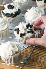 Image showing Taking a Cupcake