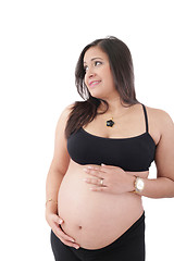 Image showing Happy pregnant woman looking away, isolated on white background