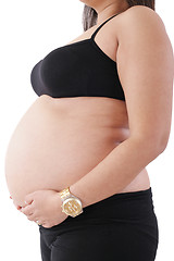 Image showing Image of pregnant woman touching her belly with hands 