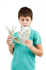 Image showing boy holding czech crown banknotes